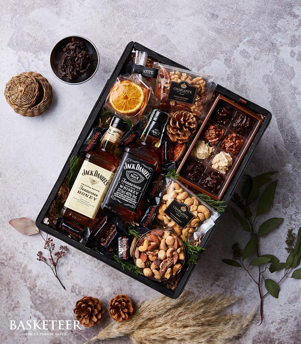 Luxury Jack Daniel's whiskey gift hamper with Tennessee Honey and Tennessee Whiskey, artisan chocolates, roasted nuts, and