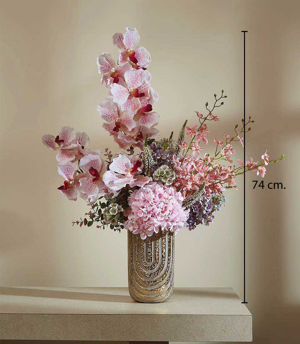 Spring Bliss artificial flower arrangement with pink orchids, hydrangeas, and filler blooms in gold-textured vase