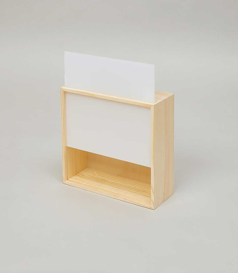 Light wooden storage box with acrylic lid, open-front design for gift hampers and curated collections