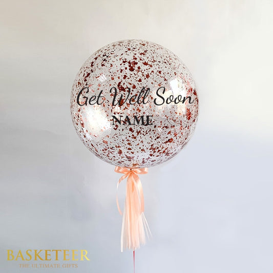 Get Well Soon helium balloon with rose gold confetti and peach satin ribbon