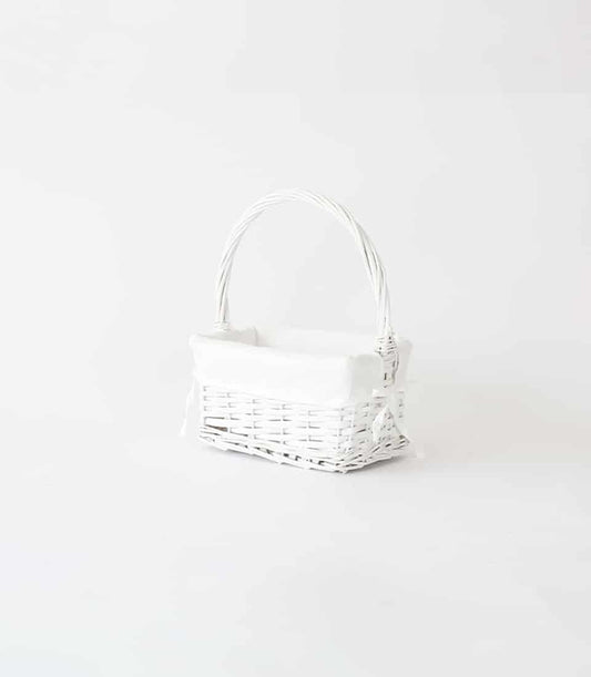 White wicker gift basket with removable liner and ribbon bow, empty luxury hamper base