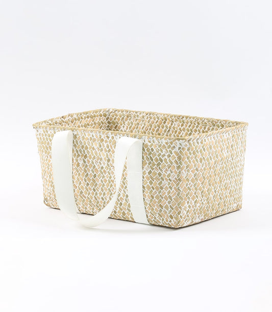Natural woven storage basket with white handles in light beige checkered pattern
