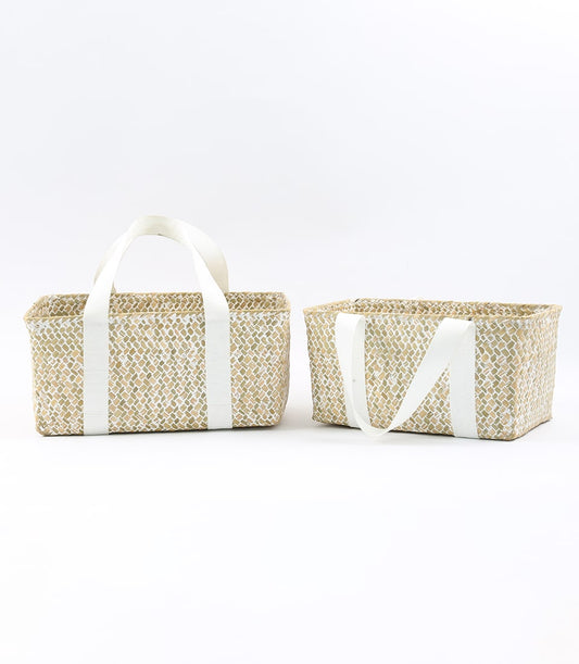 Woven gift baskets with white handles in natural light brown, ready for custom filling