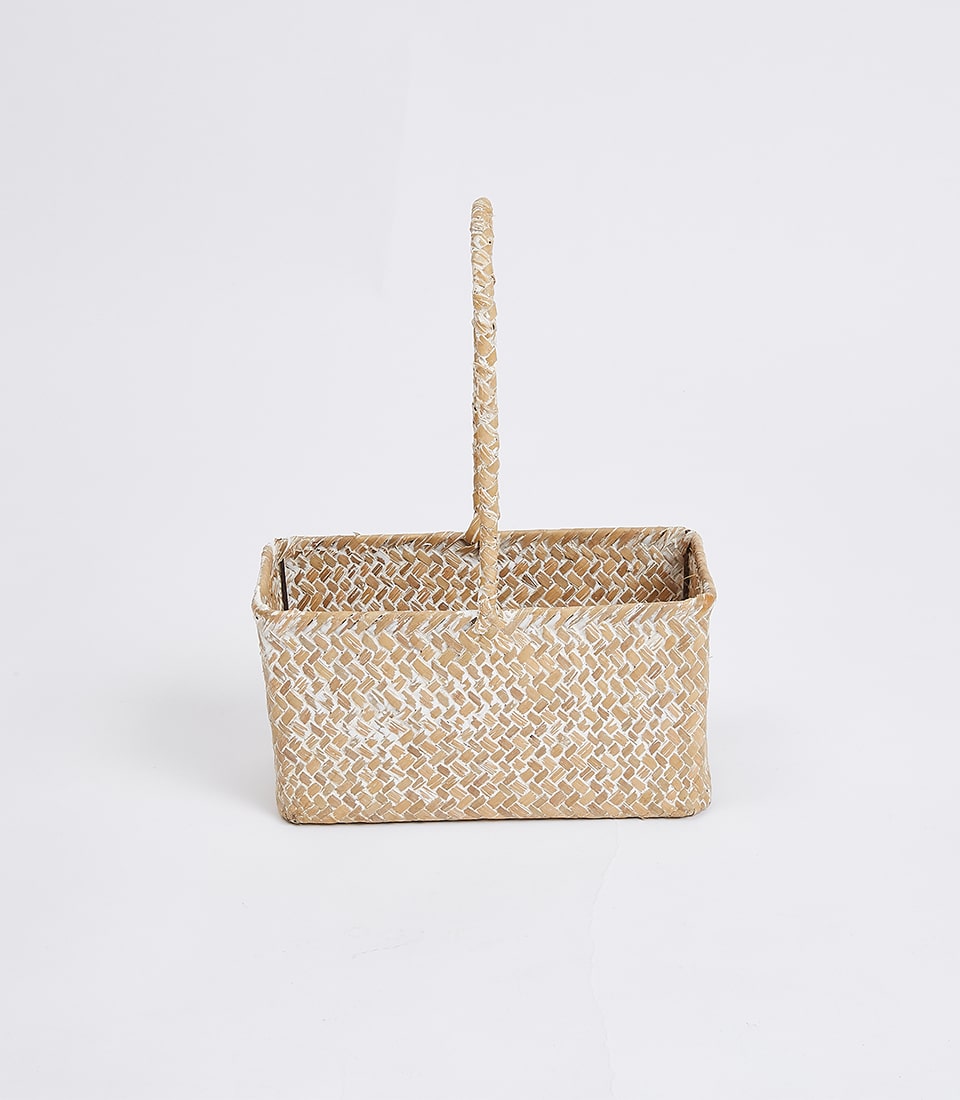 Hand-woven natural straw basket with braided handle, light whitewashed finish