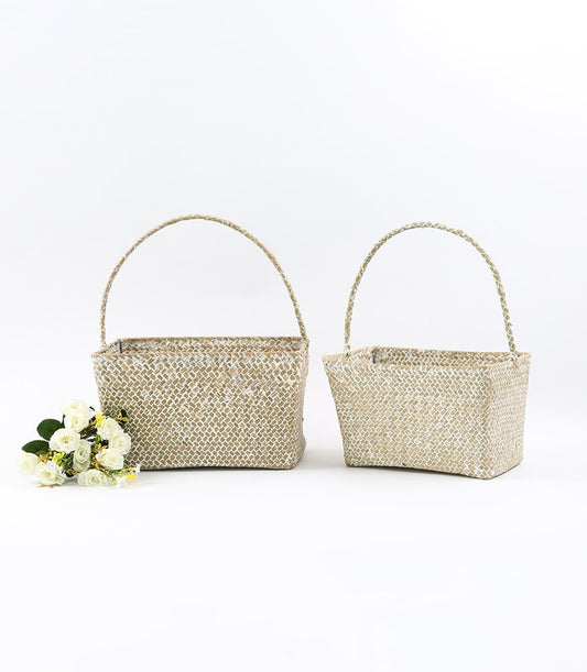 Natural woven baskets with white pattern and sturdy handles, ready for custom gift curation