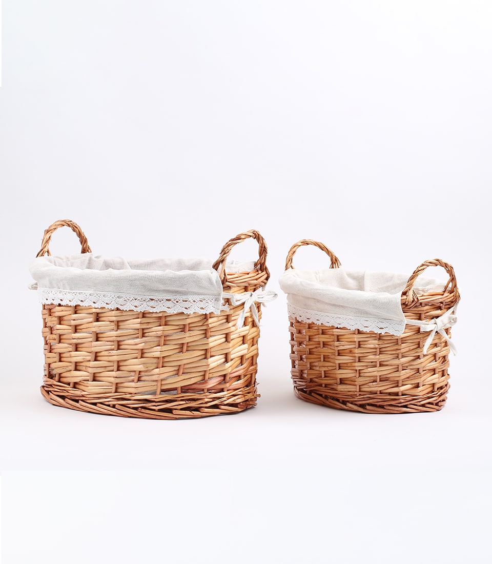 Oval wicker gift baskets with linen liners and lace trim, light brown handwoven with ribbon bows
