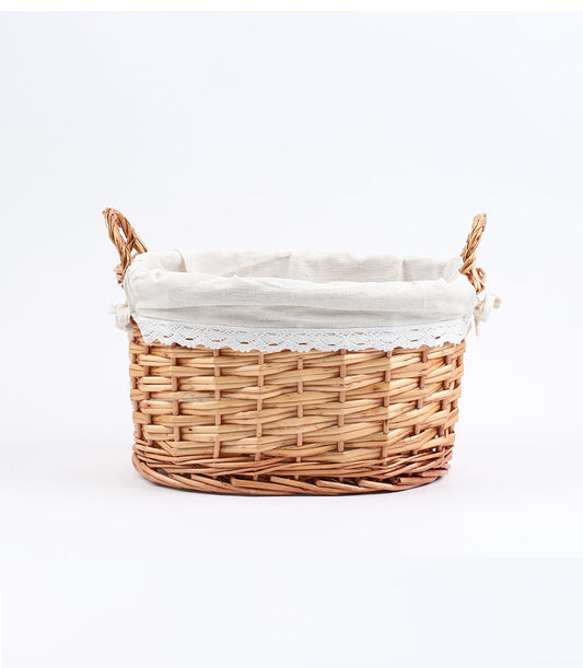 Light brown wicker basket with linen liner and lace trim, dual handles for gifting