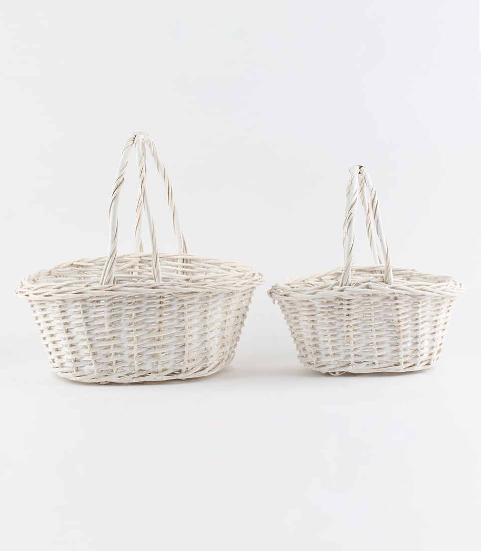 White woven oval baskets with handles, empty and ready for luxury gifting