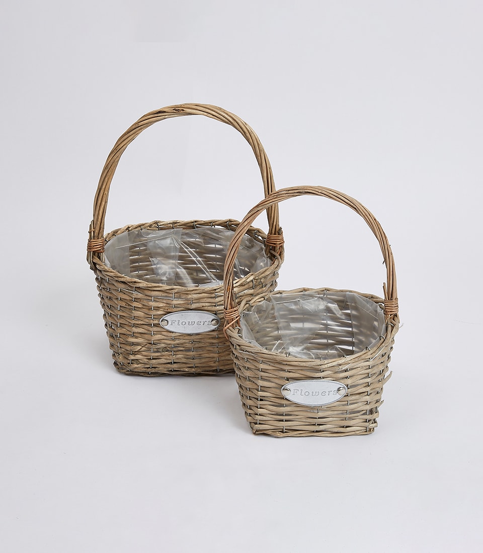 Rustic wicker gift baskets in natural brown, handcrafted with metal handles for premium hamper presentation