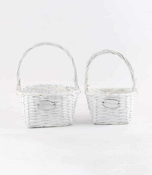 White wicker gift baskets with handles and silver nameplate, ready for custom gifting