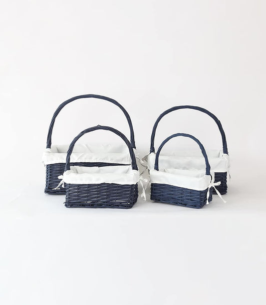 Navy rattan gift baskets with white fabric liners and arched handles, four-piece set
