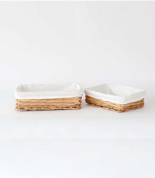 Woven wicker storage baskets with white fabric liners, light brown artisan crafted