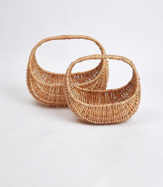 Handwoven light brown wicker semi-circle baskets with curved handles, perfect for luxury gift hampers