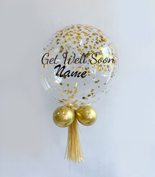 Gold confetti balloon with personalised Get Well Soon message and metallic gold tassel