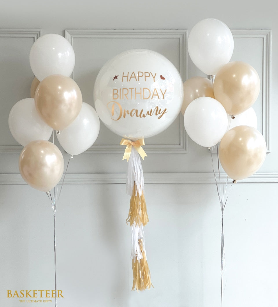 Cream and white balloon bouquet with personalized bubble balloon and gold lettering for birthday gifts