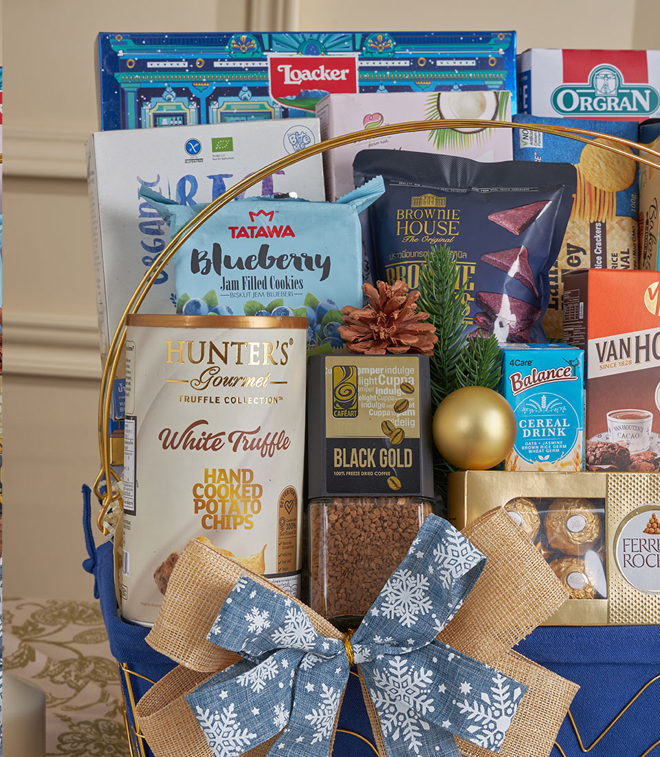 Blue gourmet gift basket with cookies, coffee, truffle chips, and chocolates, New Year celebration hamper