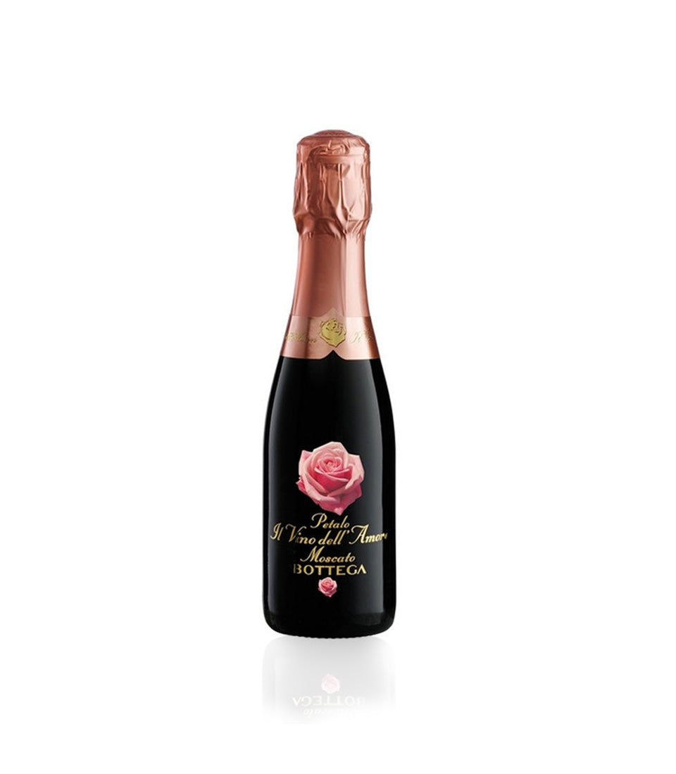 Moët sparkling wine gift in rose gold foil with pink rose label, luxury celebration basket for champagne gifting
