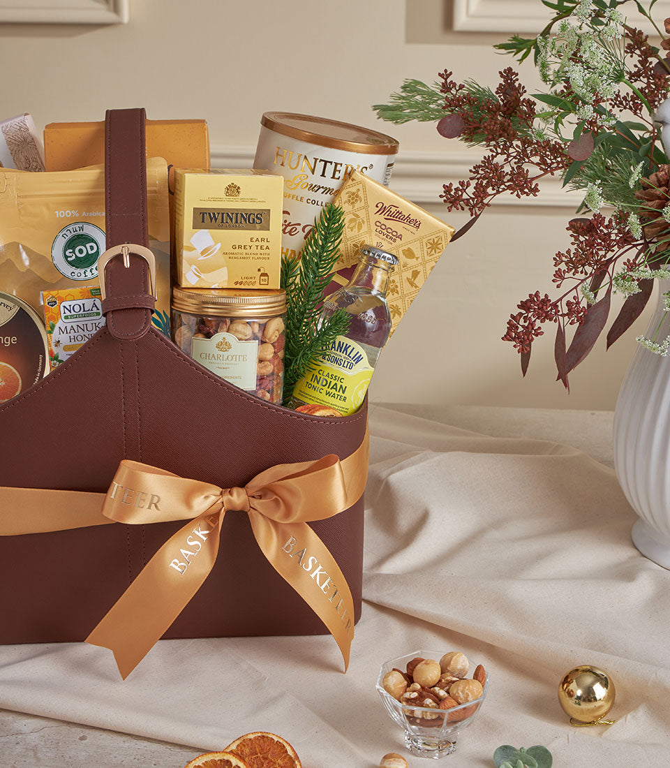 Golden Harvest leather gourmet tote with Earl Grey tea, coffee, chocolates and nuts for New Year gifting