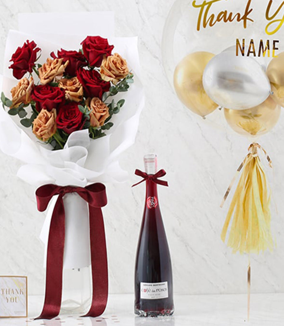 Premium red and peach rose bouquet with Café de Roses wine and gold Thank You balloon gift set