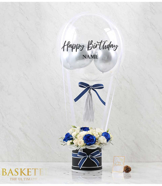 White and blue roses in striped box with Happy Birthday balloon arrangement, luxury birthday gift