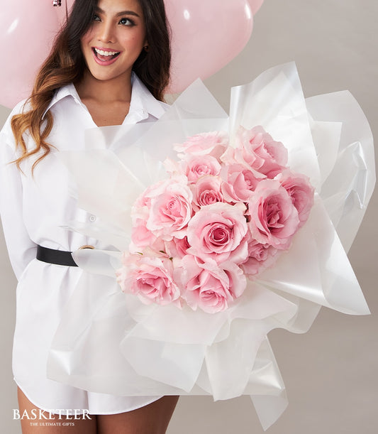 Pink roses bouquet with heart balloons, fresh celebration gift for birthday