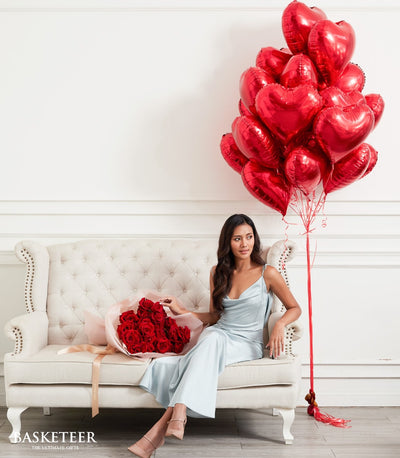 Red roses bouquet with heart balloons gift set for birthday celebrations and romantic occasions