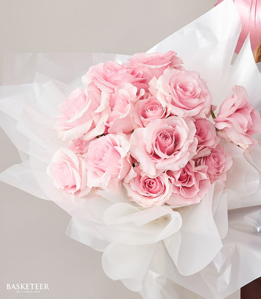 Light pink roses with white wrapping, fresh-cut bouquet for birthday gifting