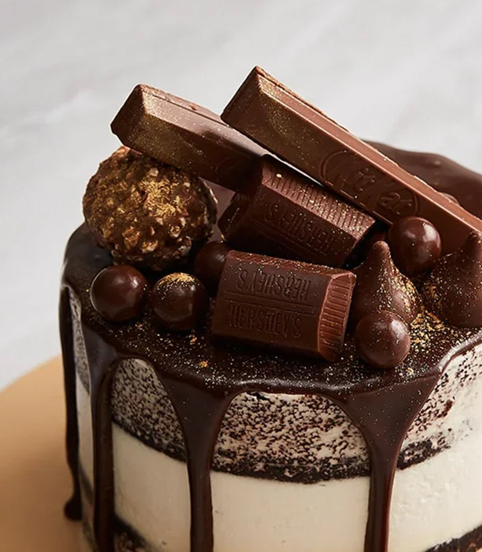 Charlotte Bakery's decadent semi-naked mini birthday cake, featuring