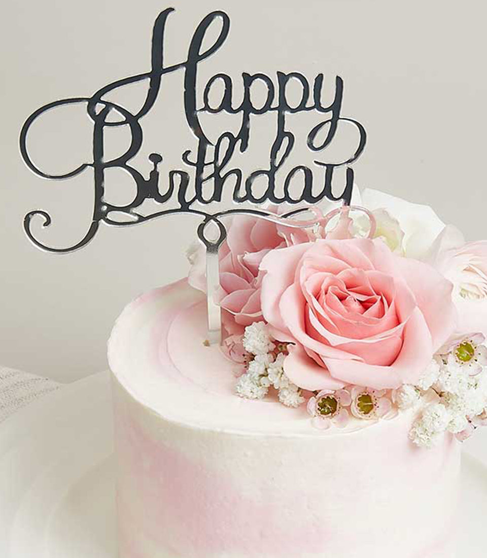 Luxurious Basketeer mini pink rose cake with delicate pink swirls,