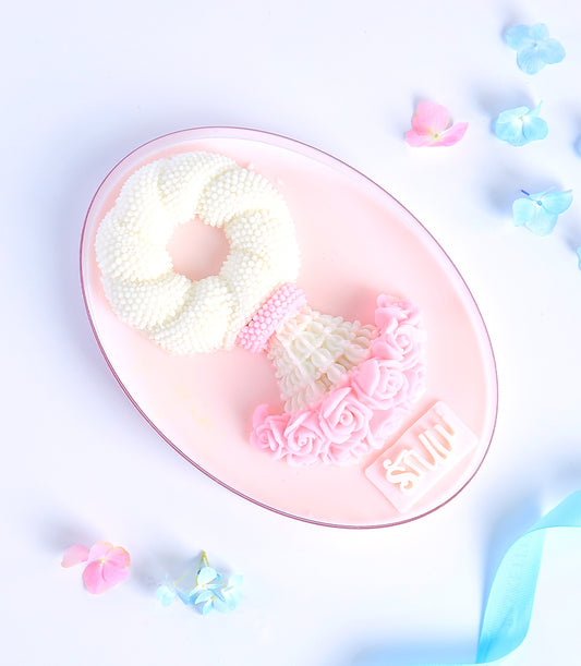 Delicate white jelly garland dessert with pink rose detail, Mother's Day gift from Charlotte Bakery