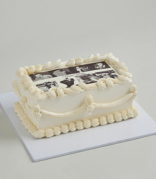 Lemon zest layer cake with white frosting, edible photo collage, and Happy Birthday script