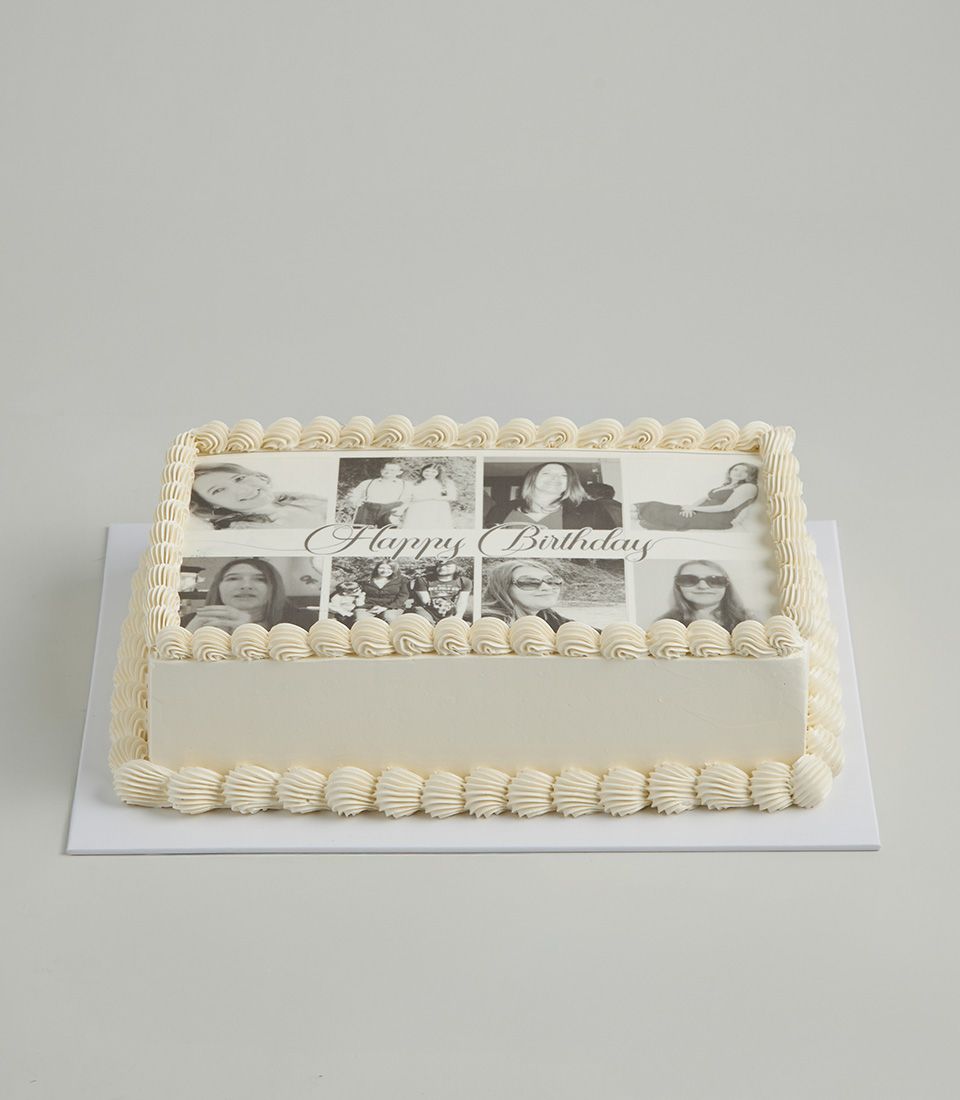 Personalised vanilla layer cake with white frosting and edible photo collage for custom birthday celebrations