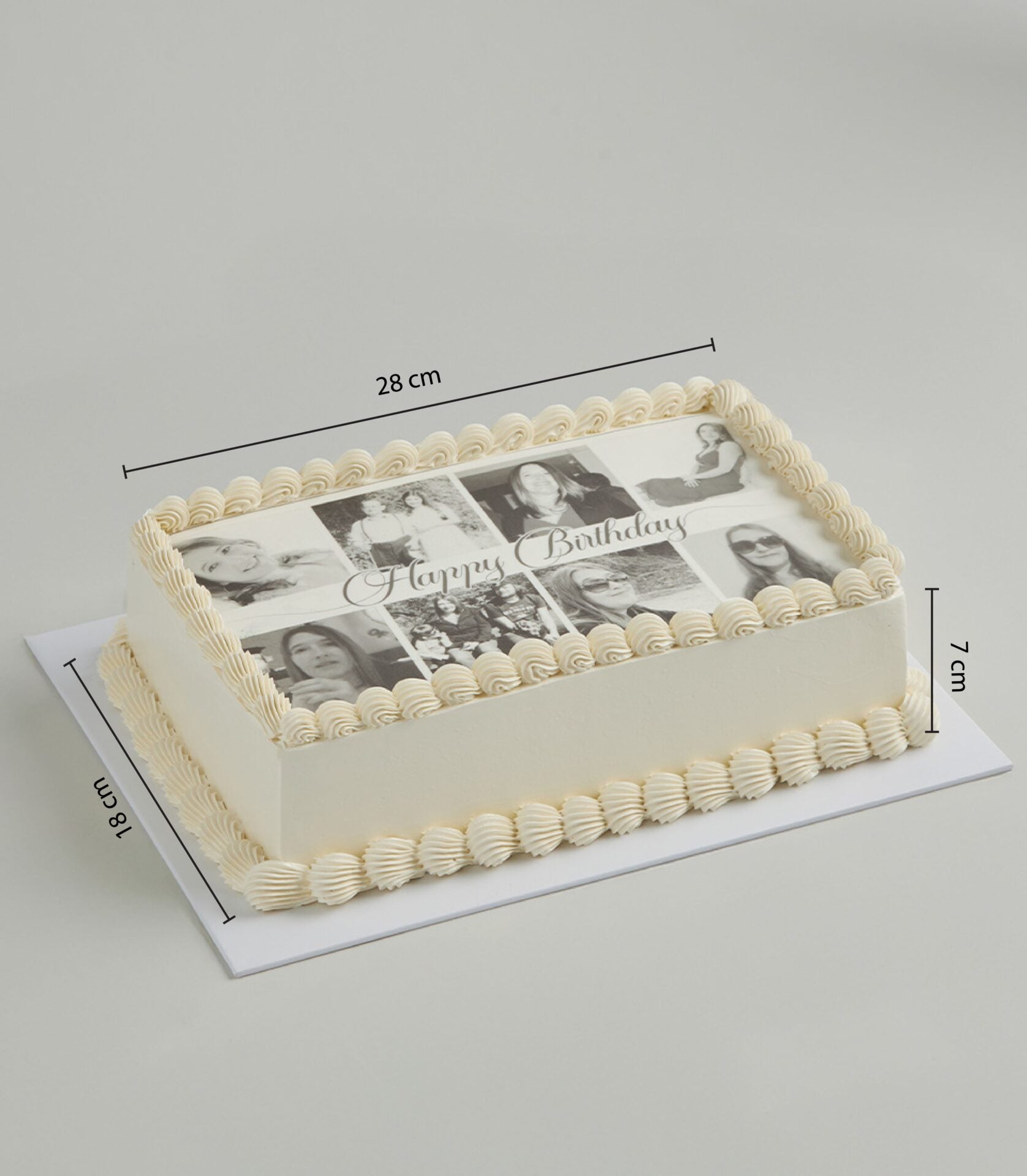 Personalised vanilla layer cake with edible photo print and Happy Birthday script, cream piped borders