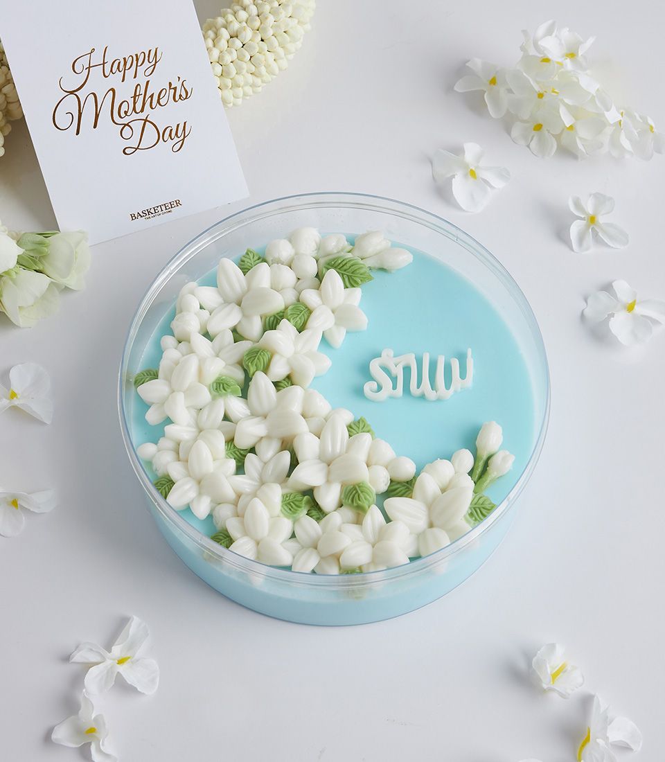 Coconut jasmine flower jelly dessert with white flowers and Mother's Day greeting card