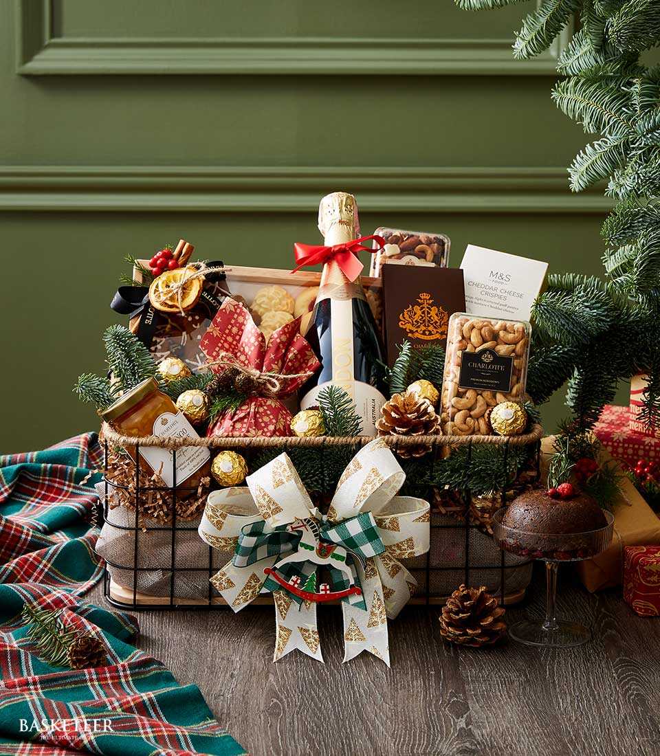 Premium Christmas hamper with Chandon Brut champagne, gourmet nuts, cheese crisps, and festive gold chocolates