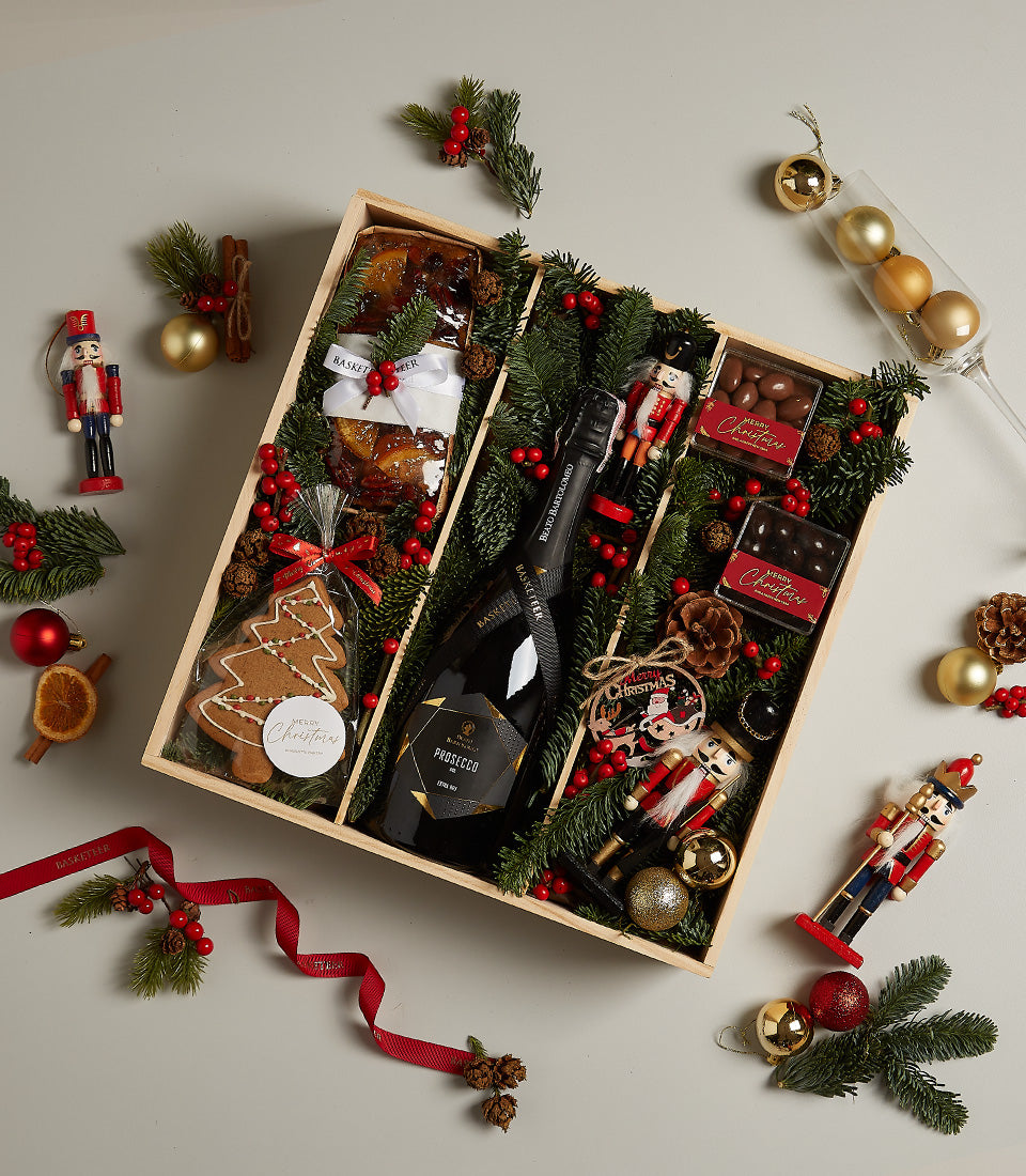 Festive Cheer Deluxe Christmas gift hamper with Prosecco, gourmet preserves, gingerbread cookies, and artisan chocolates in