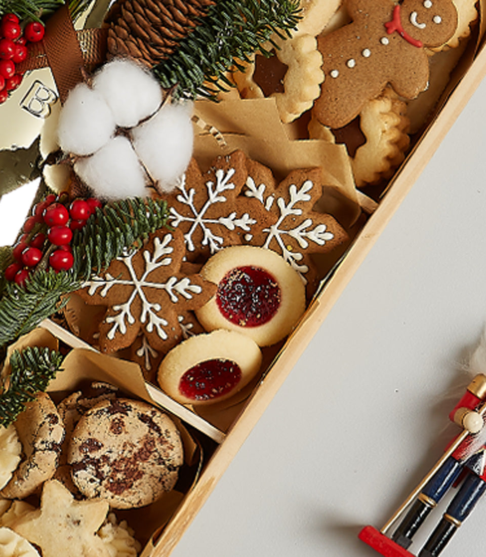 Golden Sparkling Wine & Cookie Celebration Box with gingerbread, snowflakes, and shortbread for Christmas gifting
