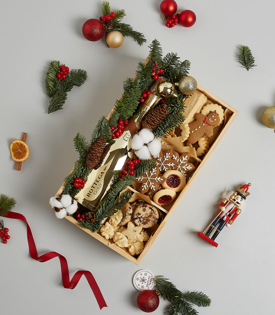 Golden Sparkling Wine & gourmet cookies Christmas gift box with Bottega Prosecco, festive pine, berries, and artisan