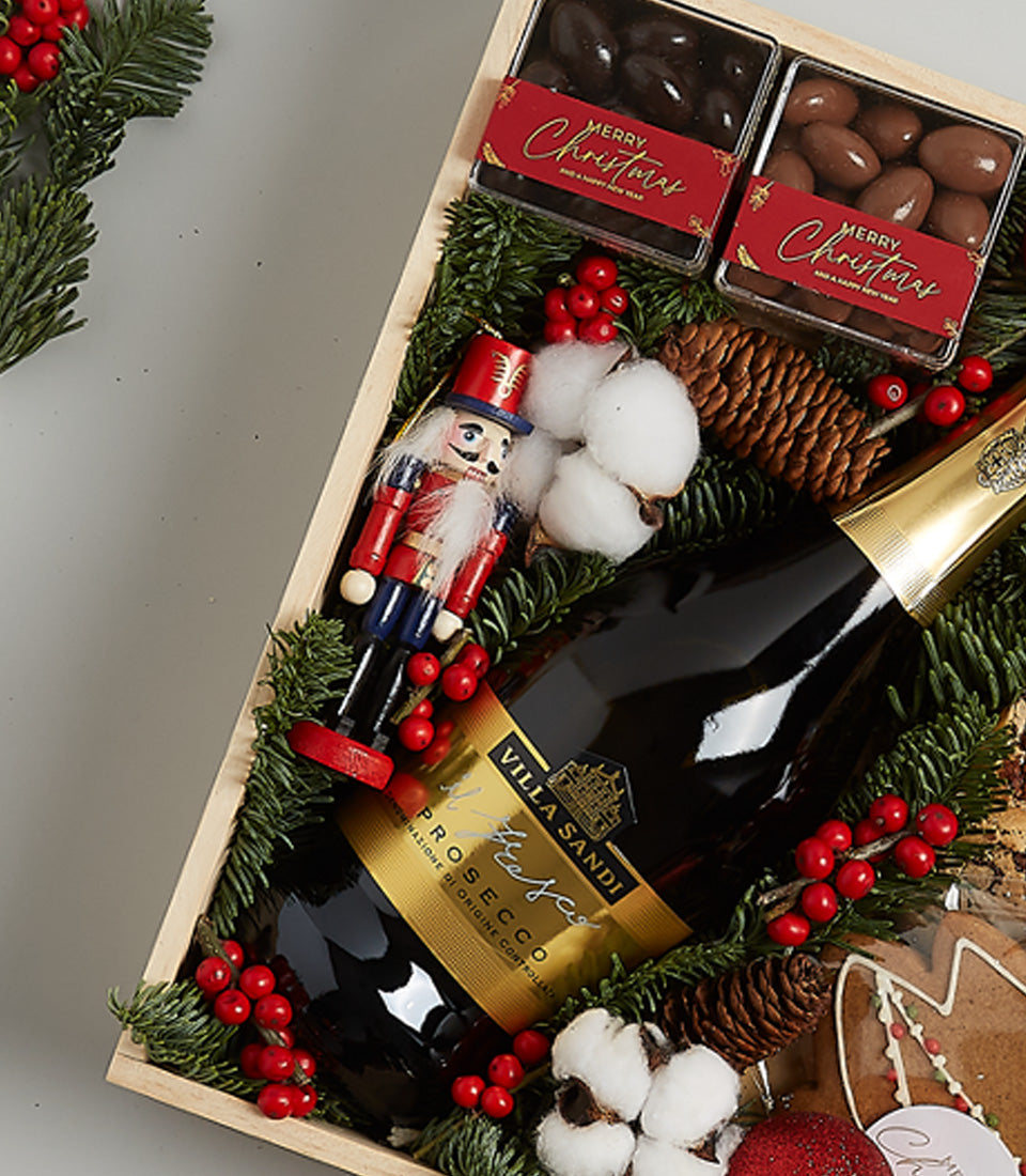 Golden Festivity luxury hamper with Villa Sandi Prosecco, chocolate-covered nuts, and festive nutcracker for Christmas