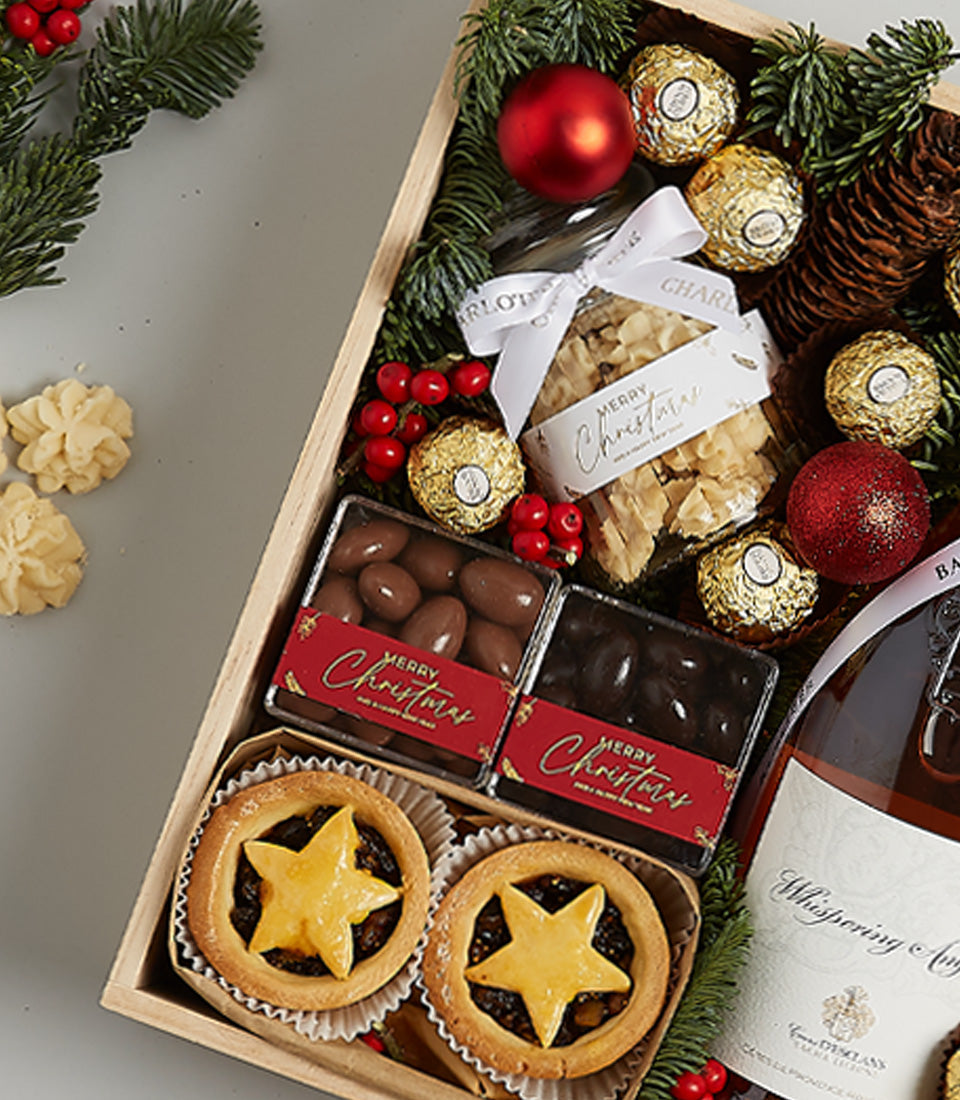 Rosé Delight Christmas hamper with wine, mince pies, artisan chocolates, and festive treats in wooden box