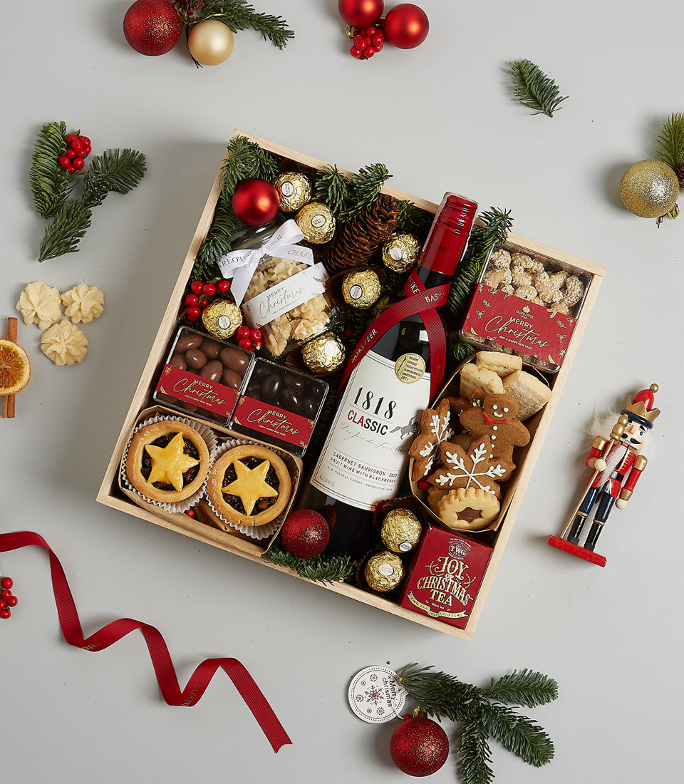 Classic Red Wine Christmas hamper with gourmet chocolates, mince pies, and festive treats in wooden gift box