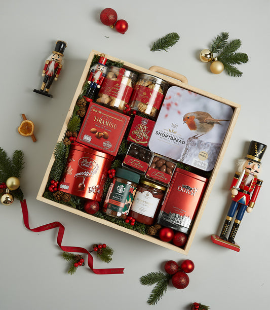 Gourmet Indulgence Christmas hamper with Tiramisu chocolates, shortbread, coffee, and festive treats in wooden tray