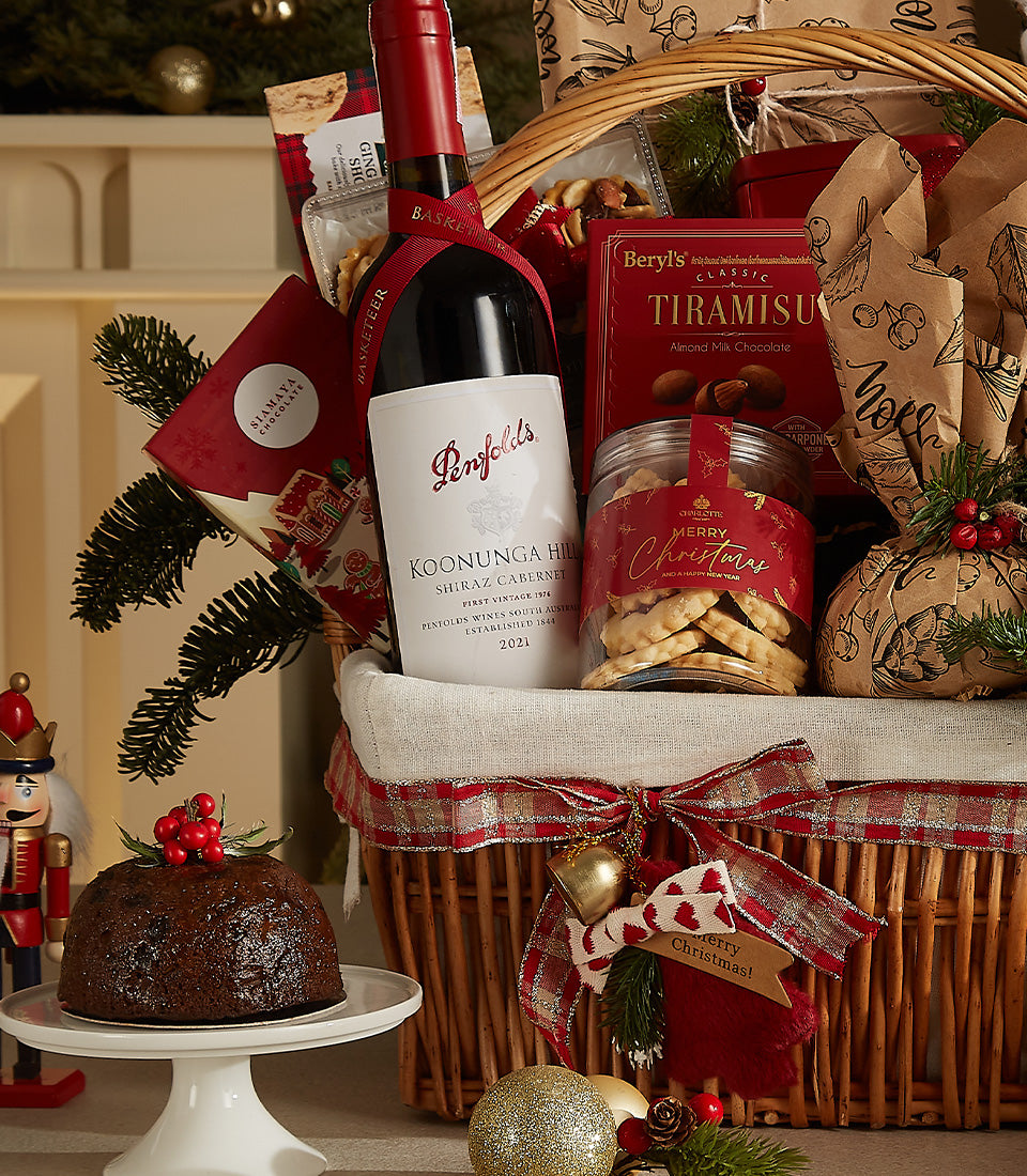 Premium red wine Christmas hamper with gourmet treats, woven wicker basket, festive plaid ribbon