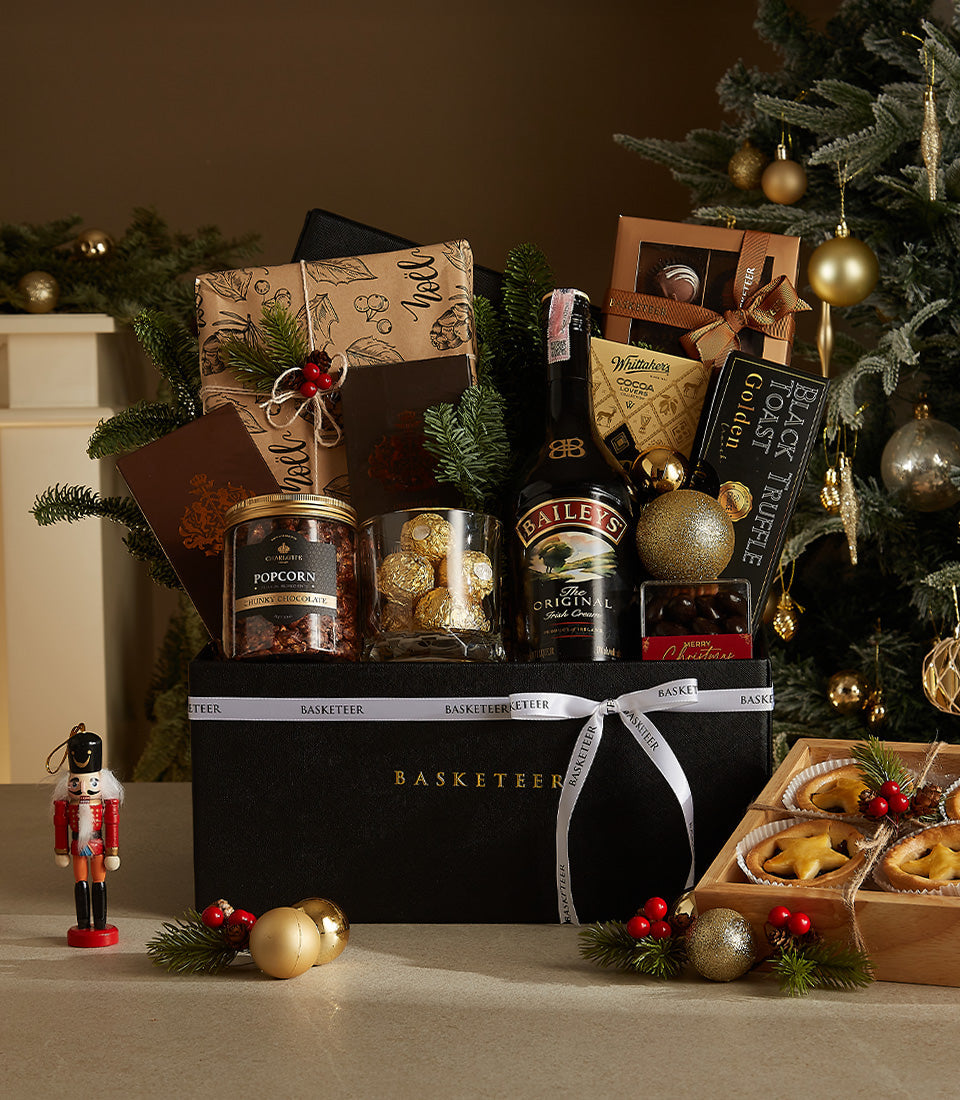 Luxury black gift box hamper with Baileys Irish cream, artisan chocolates, and festive treats for Christmas gifting