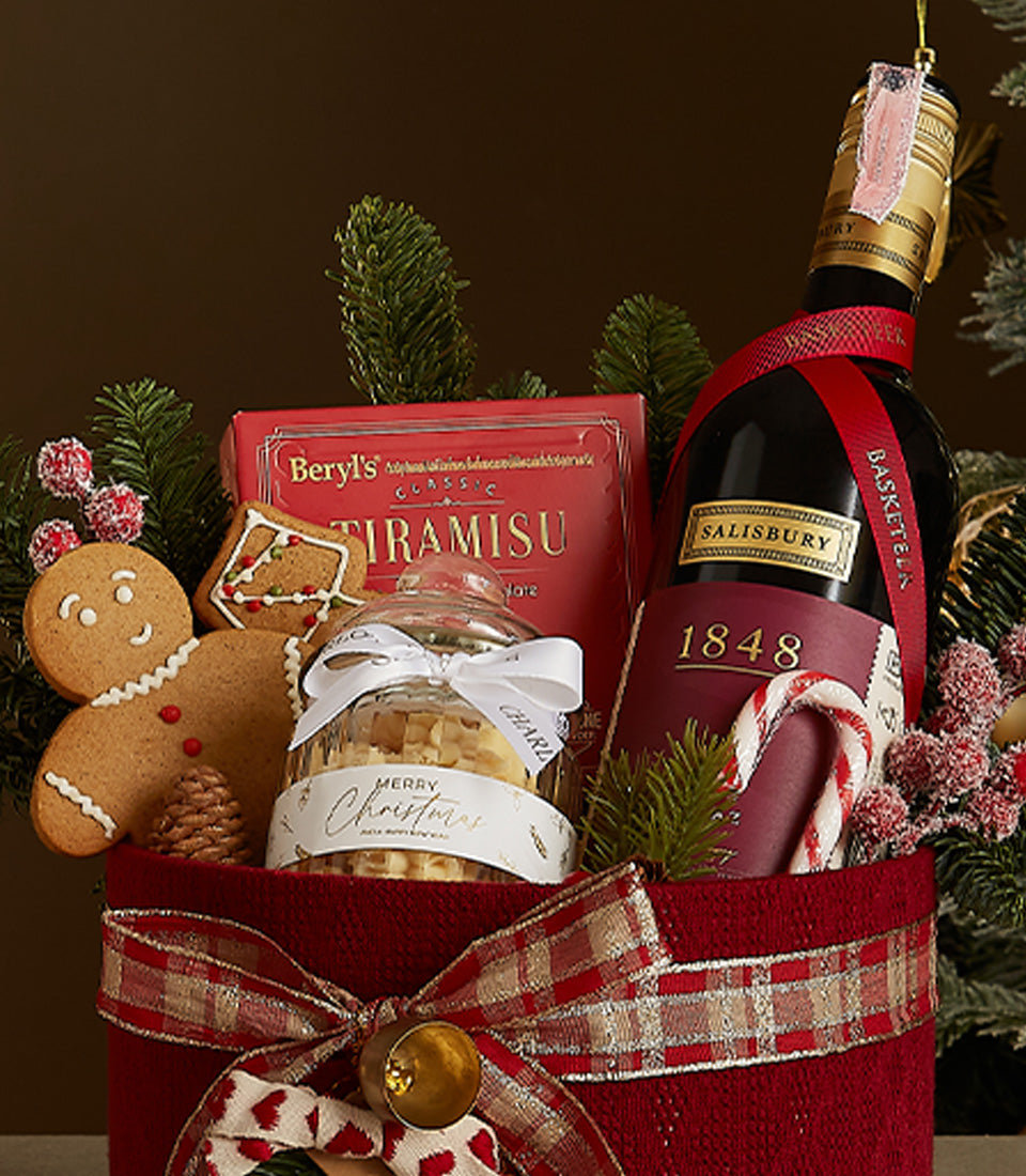Festive red velvet wine gift box with Salisbury wine, tiramisu, gourmet treats, and holiday gingerbread for Christmas