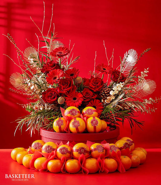 Mandarin oranges and red roses gift basket with gold accents for Chinese New Year