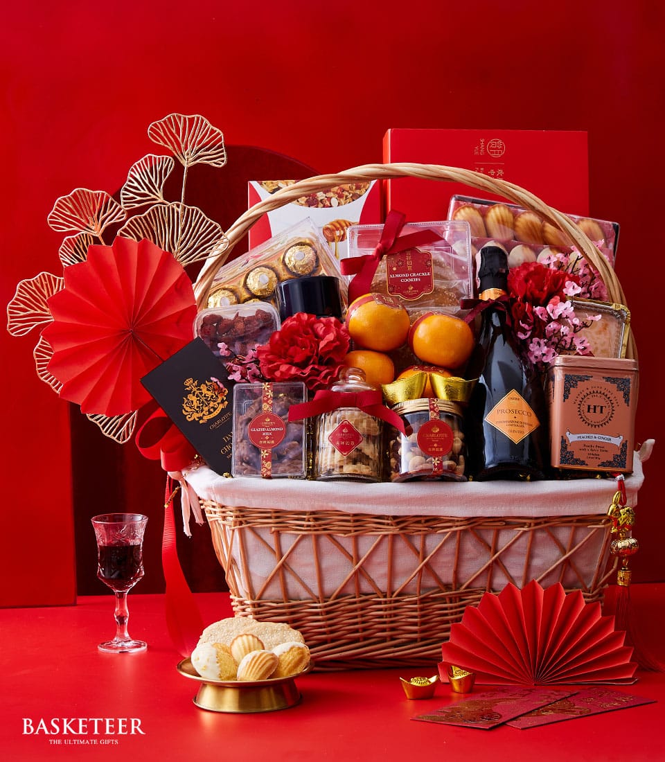 Premium wine and gourmet hamper with Prosecco, chocolates, and festive decorations for Chinese New Year