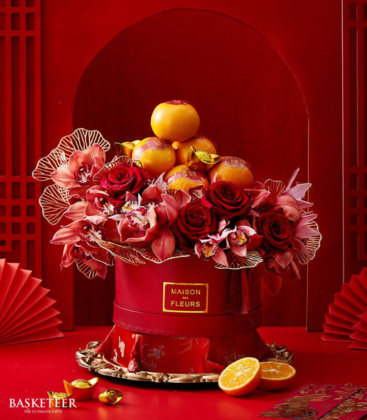 Luxury red roses and orchids with mandarin oranges and gold accents in red hatbox, Chinese New Year gift arrangement