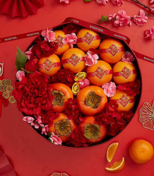 Prosperity Deluxe Fruit Box with tangerines, persimmons, and gold accents for Chinese New Year