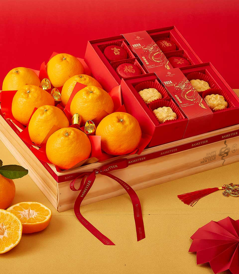 Dekopon orange hamper with lucky mandarins, gold ingots, and festive red boxes for Chinese New Year